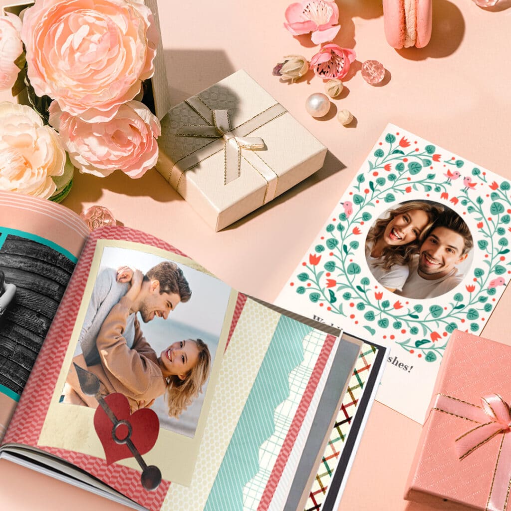 a photo book and wedding day card surrounded by wedding decorations