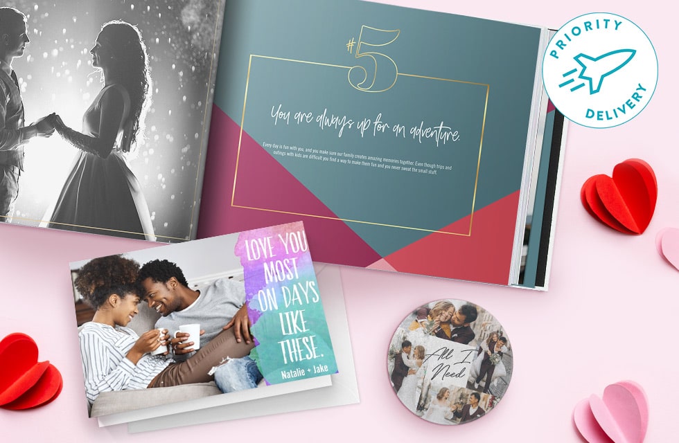 Selection of photo gifts laid out on a table with heart decor