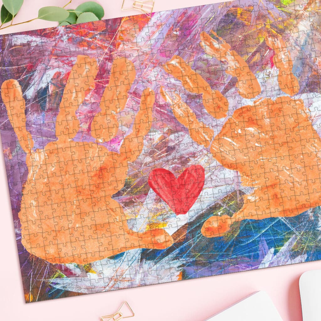 A Photo jigsaw with a childs hand print